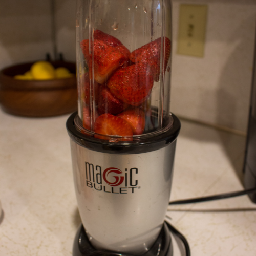 strawberries in blender on counter