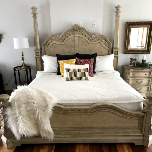 white bedding with zipper on gorgeous king size bed in bedroom